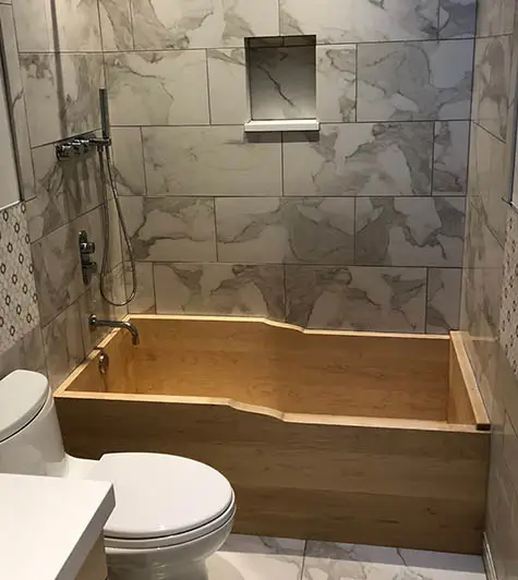 light colored wooden bathtub 2