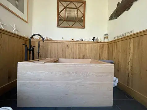 light colored wooden bathtub